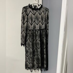 Dainty Jewells lace dress size is S